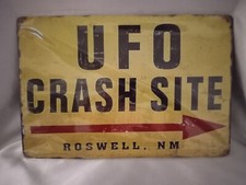 Listing image for UFO CRASH SITE ROSWELL NM METAL SIGN WALL DECOR 11.75" x 8"